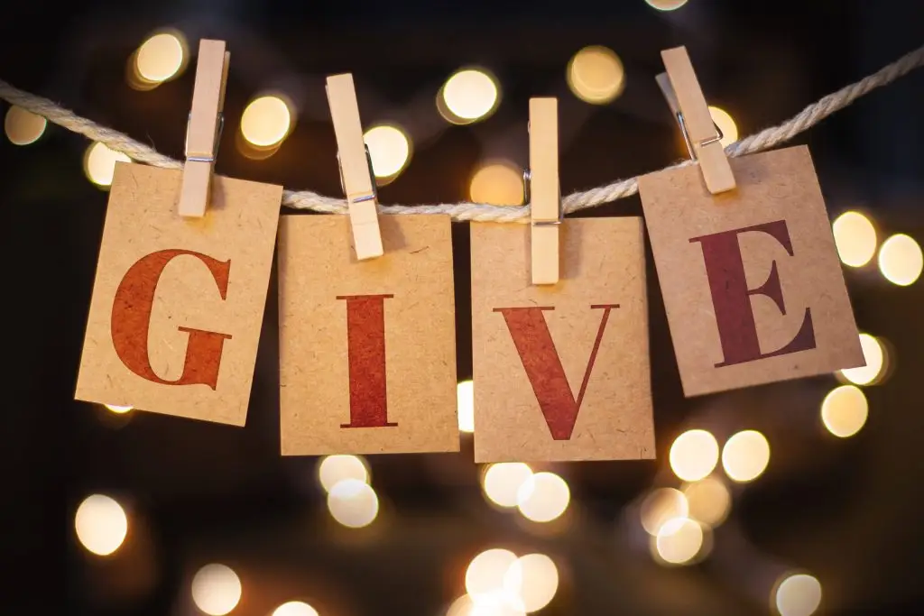 "Give" on a banner
