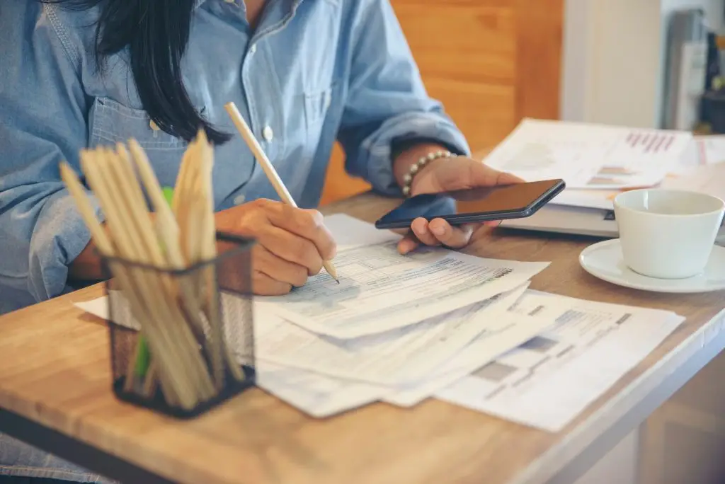 Closeup of someone working on their taxes
