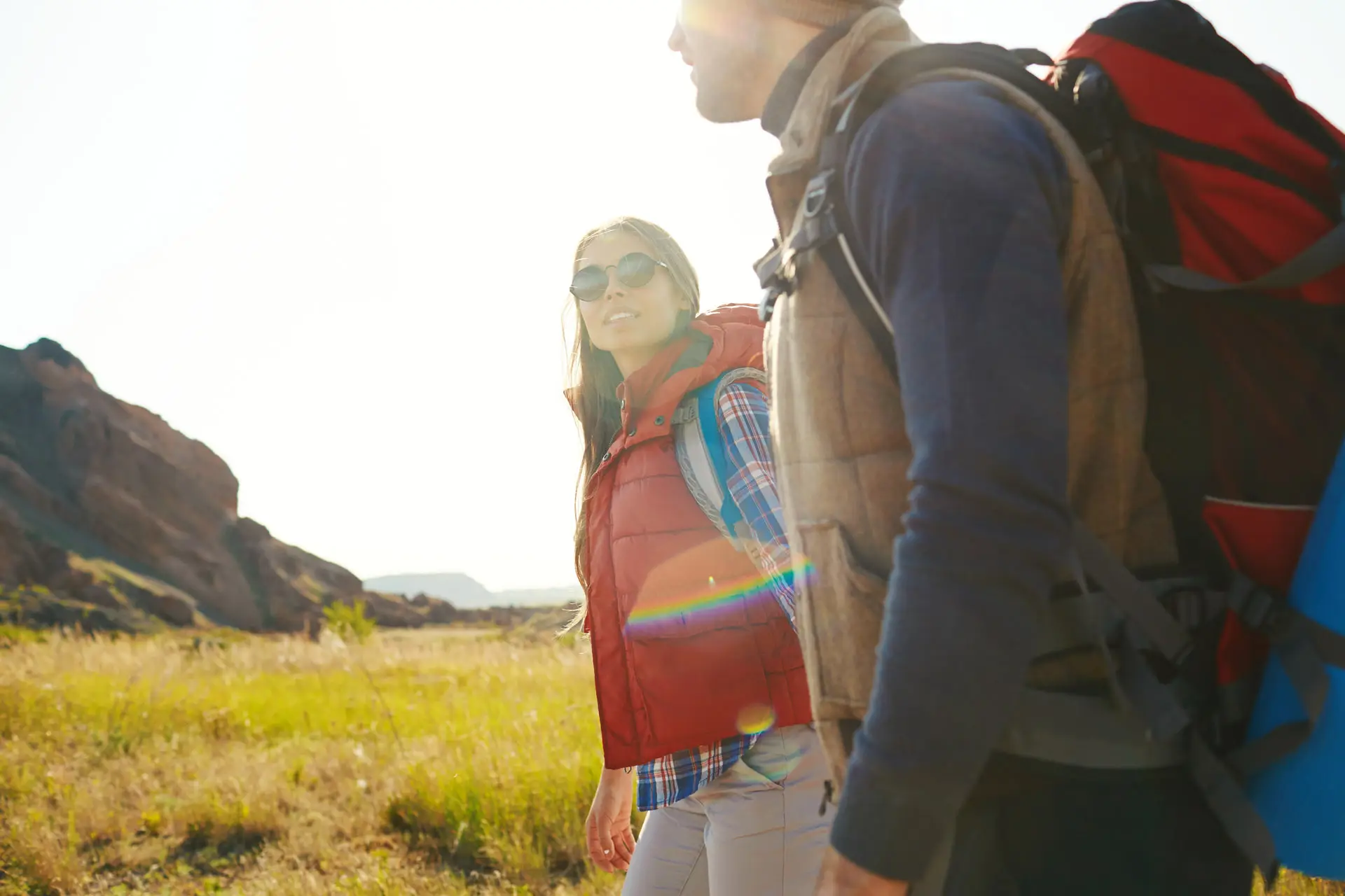 Two hikers in a field