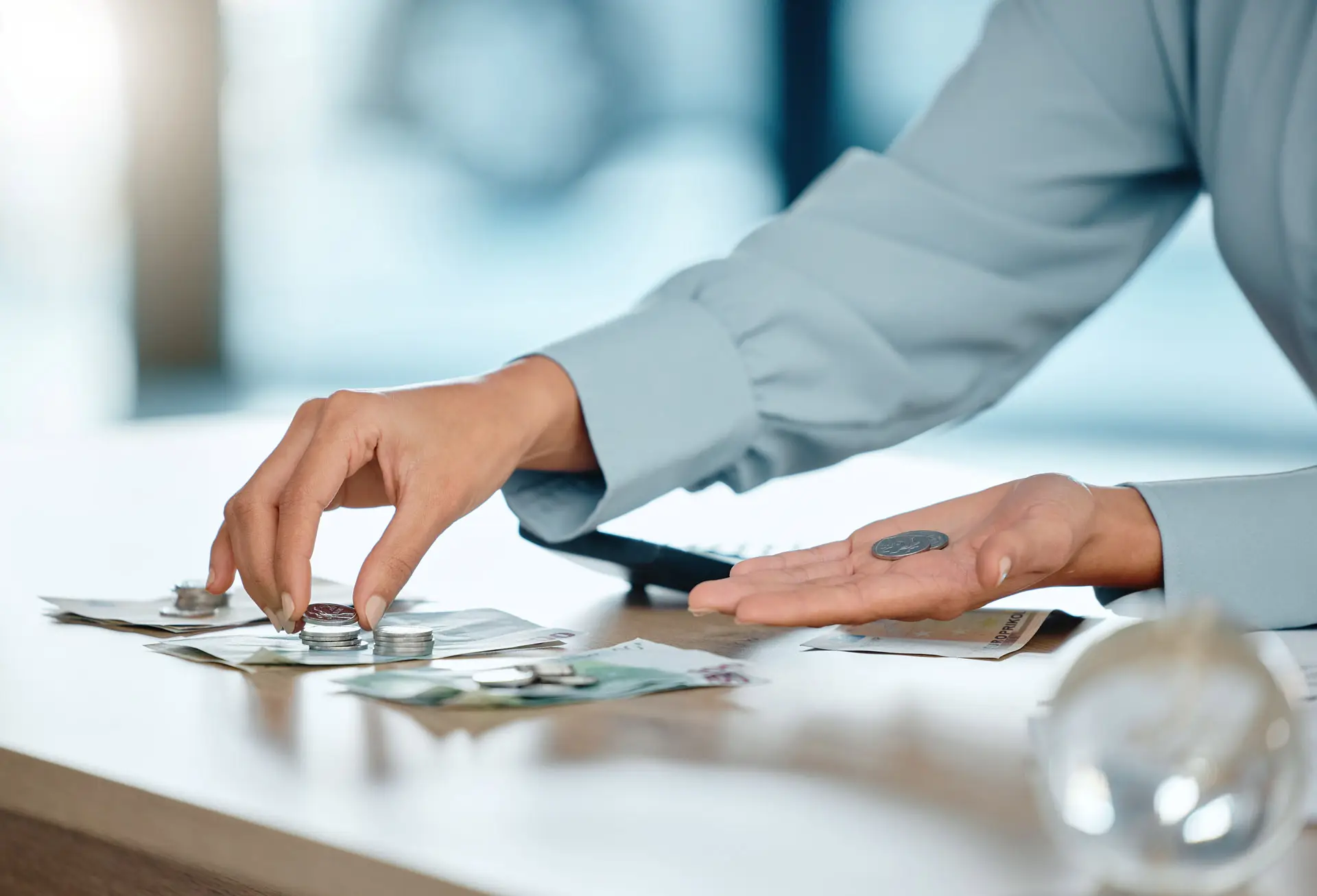Closeup of hands counting money
