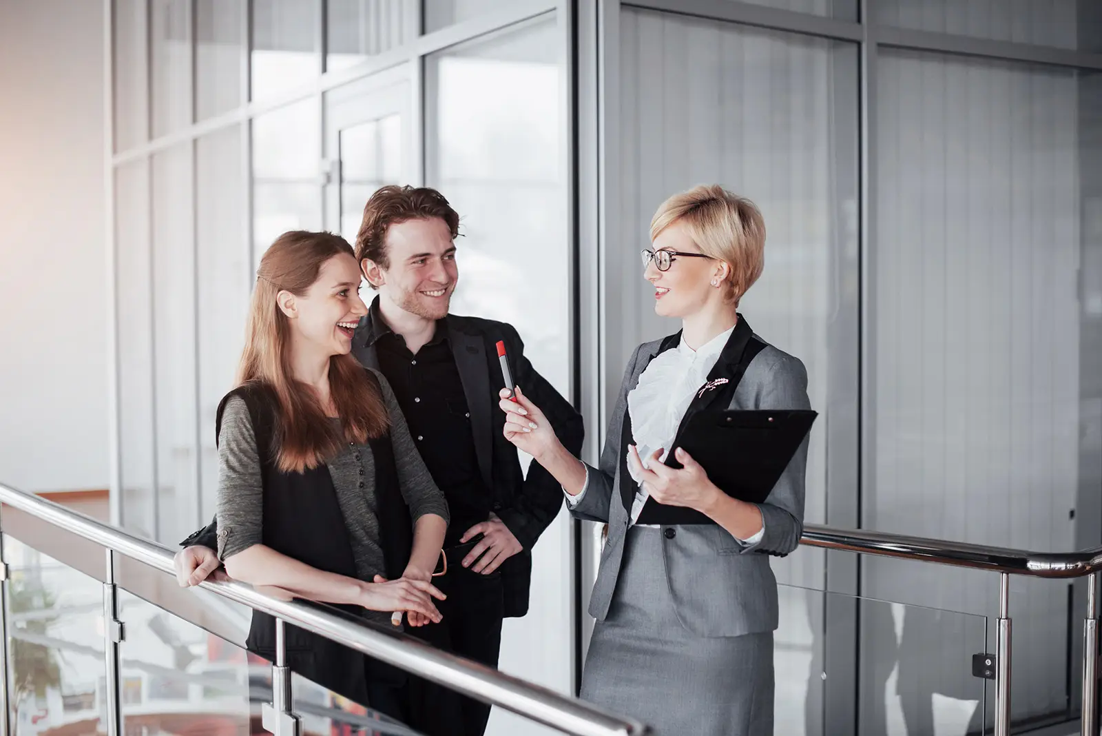 Credit union banker smiling at a couple