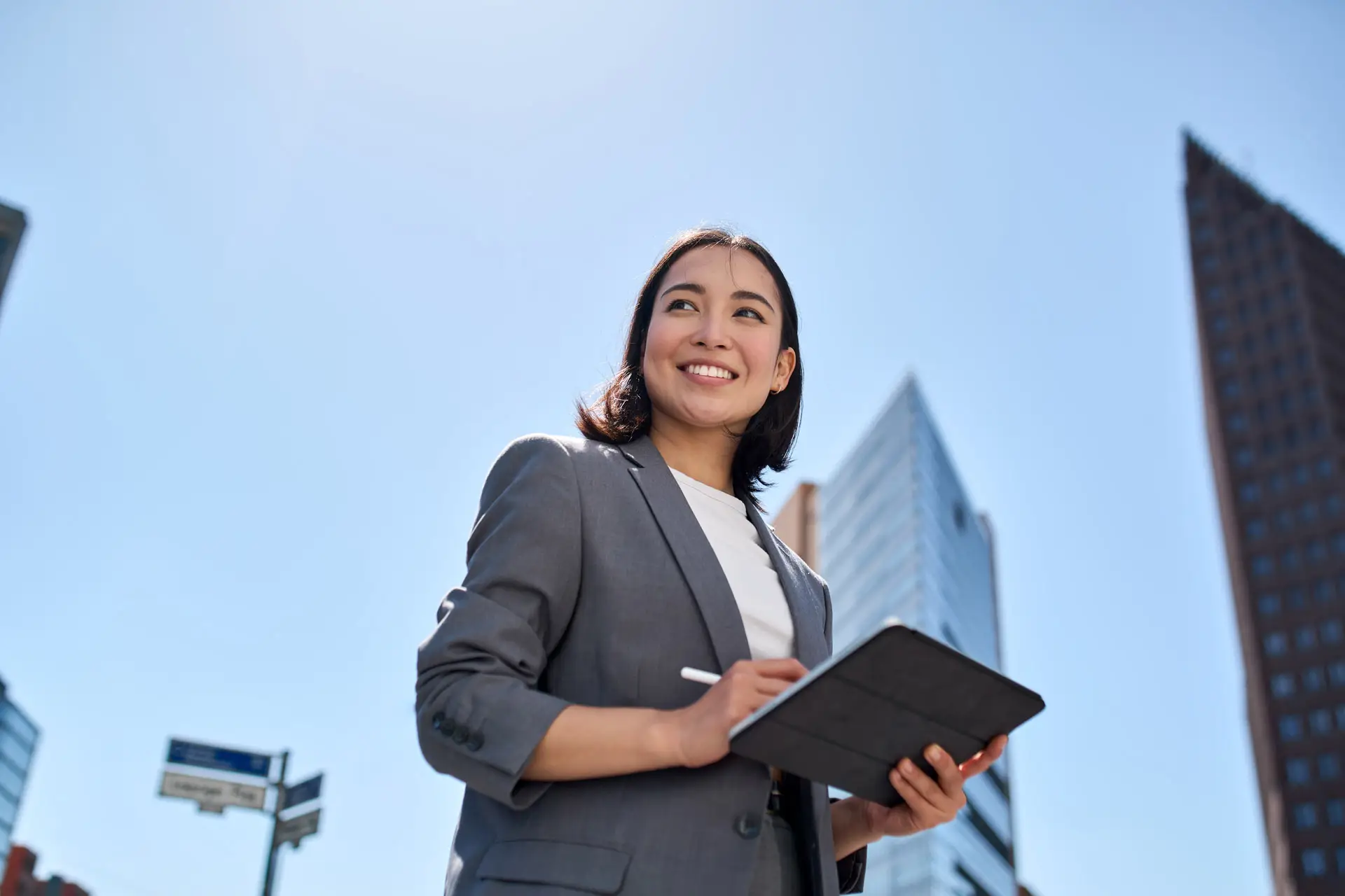 Business woman holding a tablet